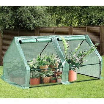 A single Outsunny 5.9’ L x 3.0’ W x 3.0’ H Portable Mini Greenhouse - 2 Large Zipper Doors Garden Planter